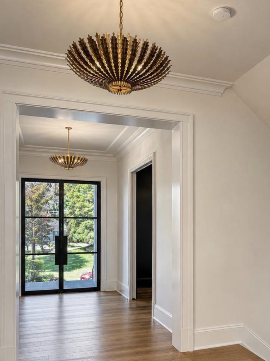 Entry hall with a steel-framed glass front door